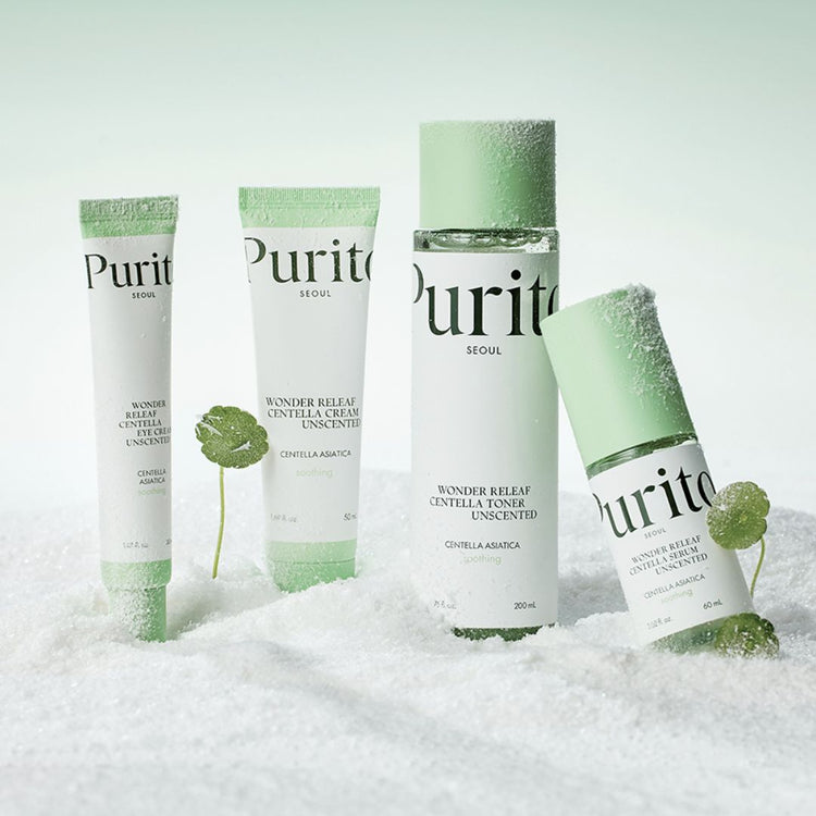Set of Purito's Wonder Releaf Centella Unscented line on a blanket of snow with small cica plants