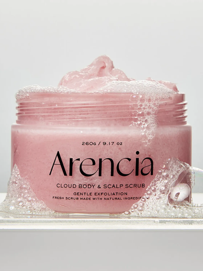 Open jar of Arencia Cloud Body & Scalp Scrub (Lavender & Pear) surrounded bubbles against a light grey background.
