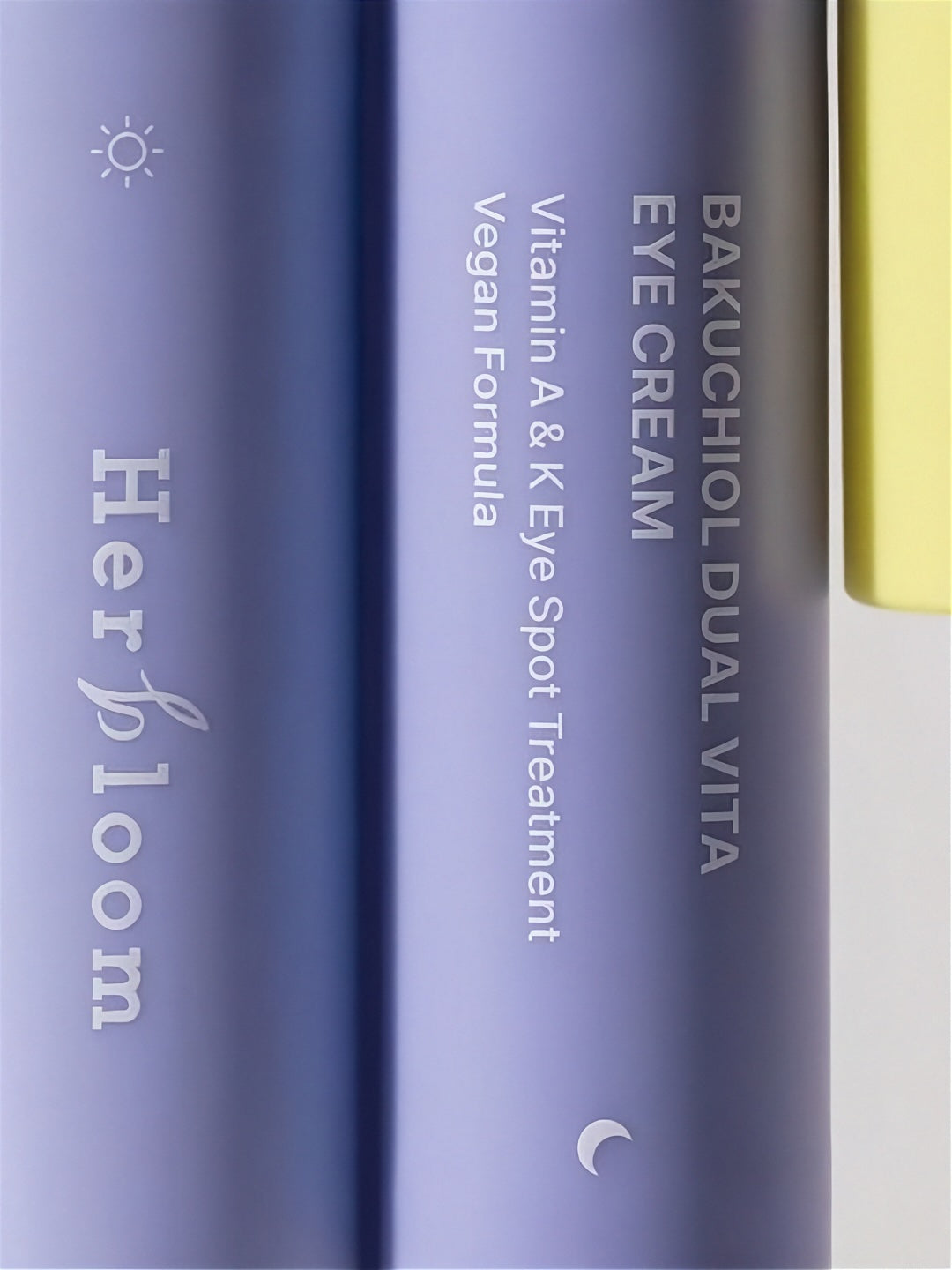 Close up of two tubes of Herbloom Bakuchiol Dual Vita Eye Cream.