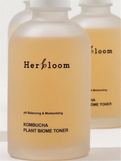 Close up of Herbloom Kombucha Plant Biome Toner bottles on a white baackground
