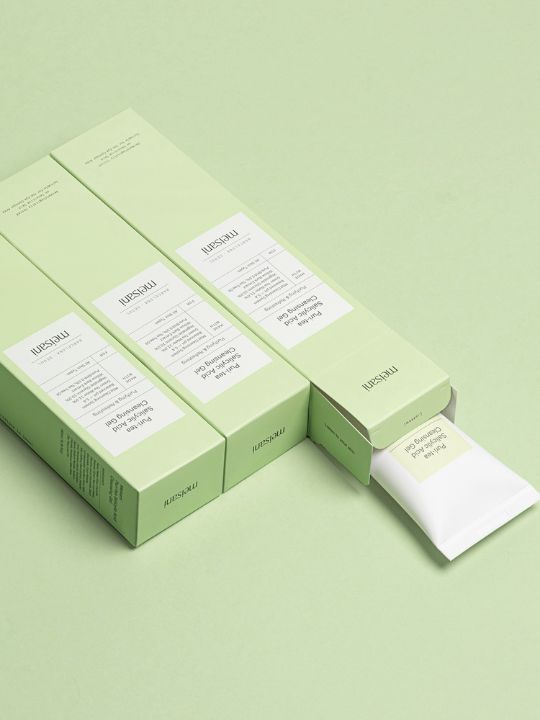 Meisani Puri-Tea Salicylic Acid Cleansing Gel product packaging detail on green background