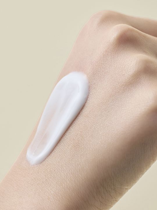 Meisani Aloe-lujah Sunscreen Serum on a hand