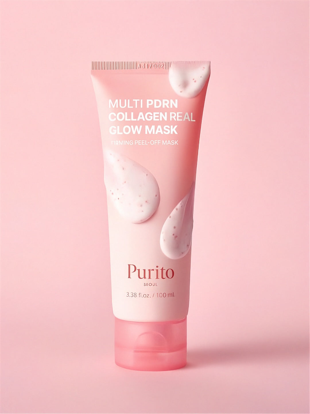 Purito Multi Porn Collagen Real Glow Mask  with foam on tube against a pink background