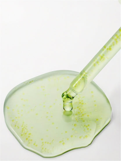 Close up dropper from Purito Seoul Azelaic Acid 10 Kojic Tea Tree Serum being dripped onto a white surface