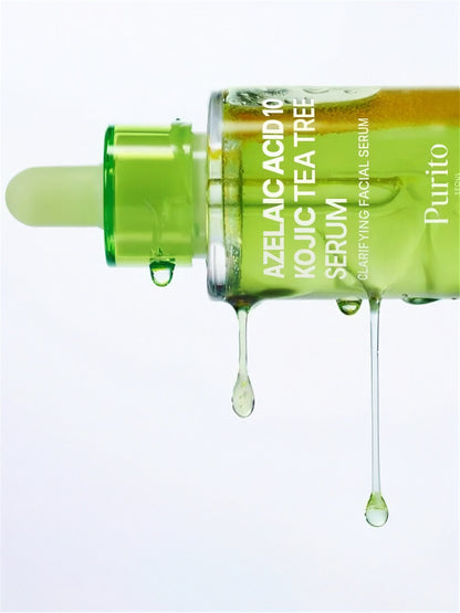 Purito Seoul Azelaic Acid 10 Kojic Tea Tree Serum on its side with green serum dripping down, on a white background