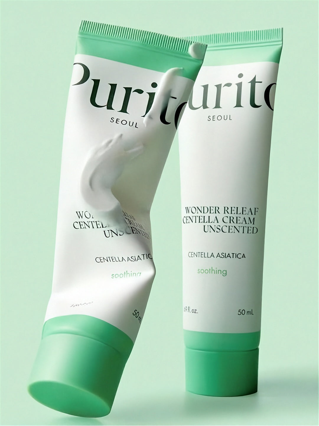 Two tubes of Purito Wonder Releaf Centella Unscented Cream, one tube is bent, against a light green background