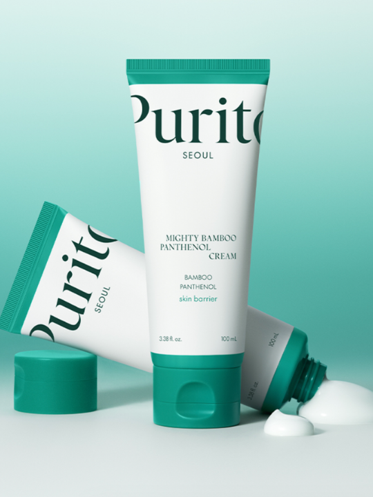 Two tubes of Purito Mighty Bamboo Panthenol Cream with product squeezed from one tube, against light green background.