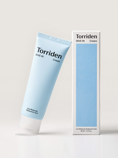 Tube of Torriden Dive In Hyaluronic Acid Cream leaning on its box, against a light grey background. Available at Sinless Skincare.