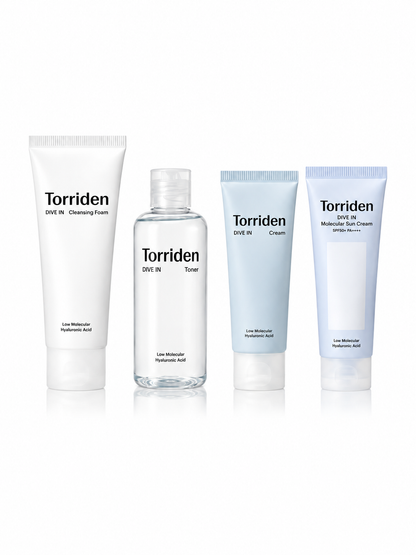 Four Torriden dive-in skincare products arranged on a white background: a white cleansing foam tube, a clear toner bottle, a blue cream tube, and a blue sunscreen tube.