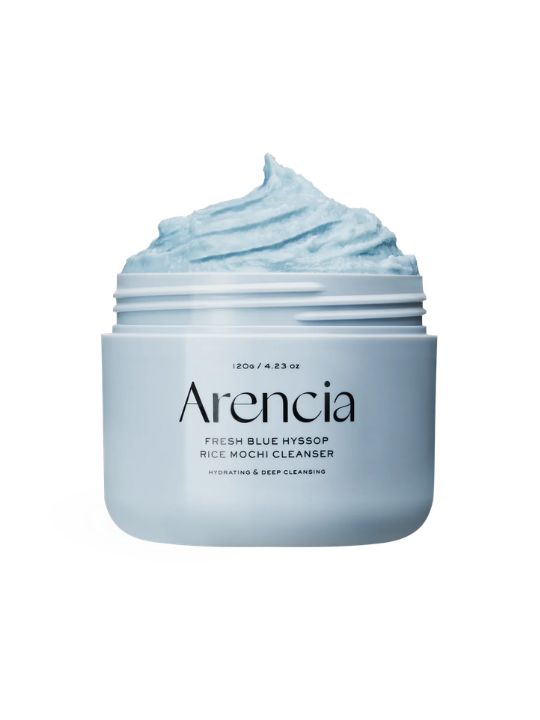 Open jar of Arencia Blue Hyssop Rice Mochi Cleanser on a white background