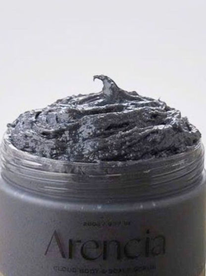 A close-up of an open Arencia Cloud Body & Scalp Scrub (Black Tea & Yuzu) jar against a white background.