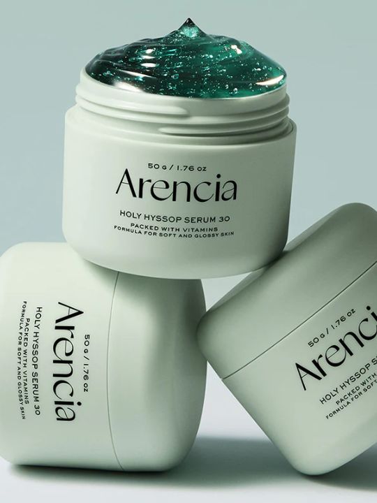 Three jars of Arencia Holy Hyssop Serum 30 on a light gray background