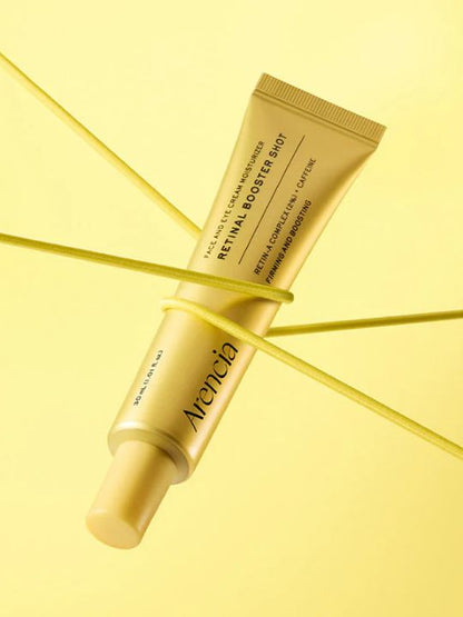 Tube of Arencia Retinal Booster Shot tied up with yellow wire on a yellow background