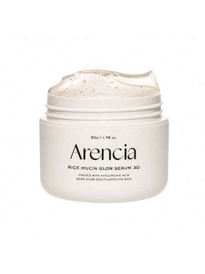 A white jar of Arencia Rice Mucin Glow Serum 30 with a translucent, gel-like cream visible at the open top, set against a plain white background.