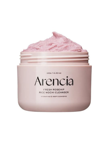 Open jar of Arencia Rosehip Rice Mochi Cleanser on a white background