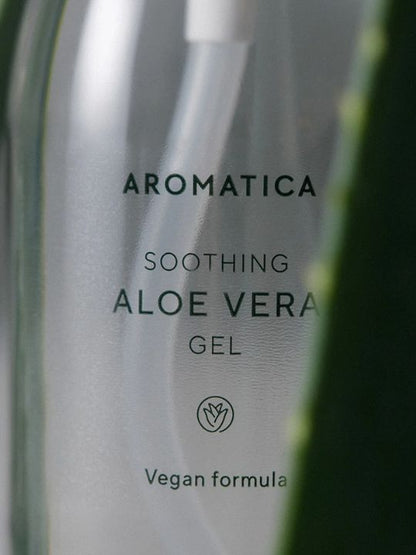 Close up label from bottle of Aromatica Organic Aloe Vera Gel with a green element in front