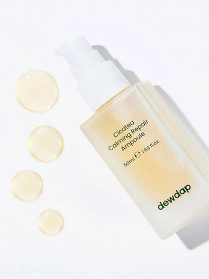 Dewdap Cicatea Calming Repair Ampoule with 4 drops of beige liqid on a white background