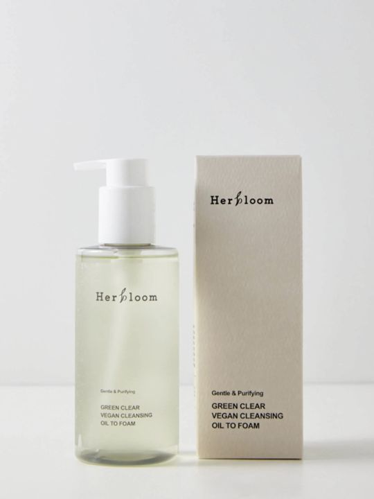 Herbloom Green Clear Cleansing Oil to Foam pump bottle standing next to its retail box against a white background