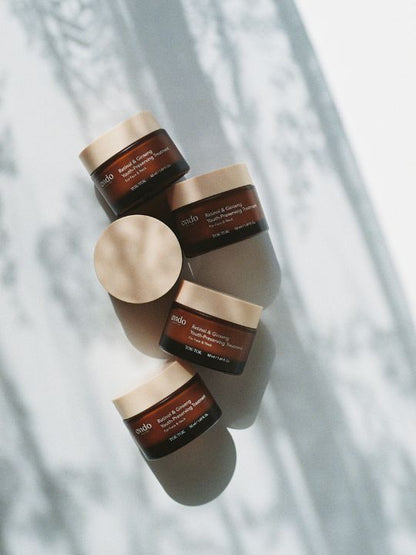 Five jars of ondo beauty retinol & ginseng youth preserving treatment on a light background with shadows