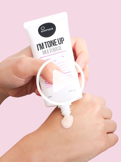 Suntique's I'm Tone Up Multi Base Sunscreen is being applied to a model's hand.