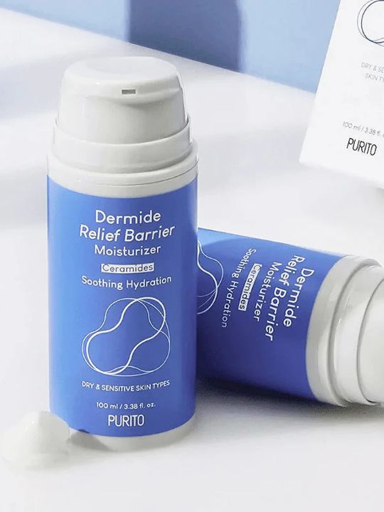 Two bottles of Purito Dermide Relief Barrier Moisturizer on a neutral background