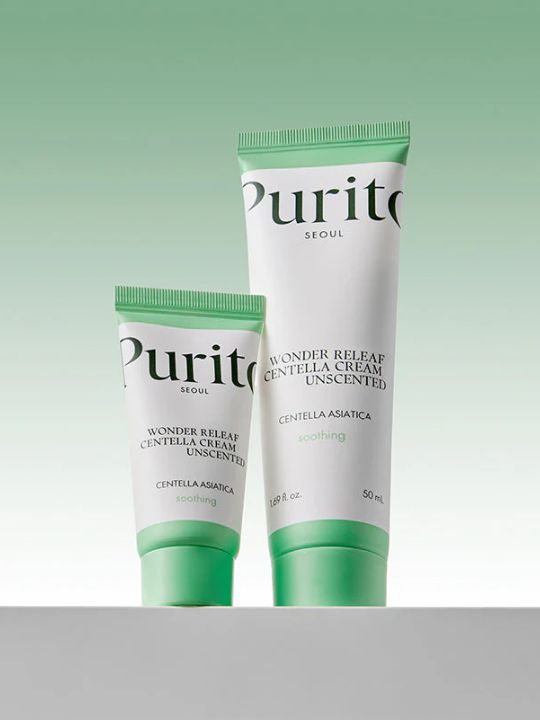 Two different sizes of cream tubes from Purito Wonder Releaf Centella Unscented on a gradient green background