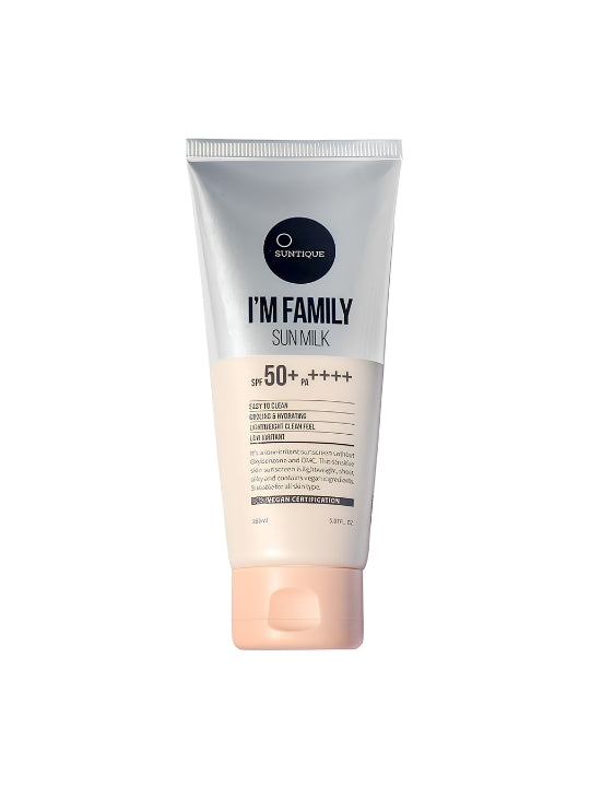 A tube of Suntique I'm Family Sun Milk sunscreen, featuring a white and pale peach design with a black circular logo, set against a plain white background.